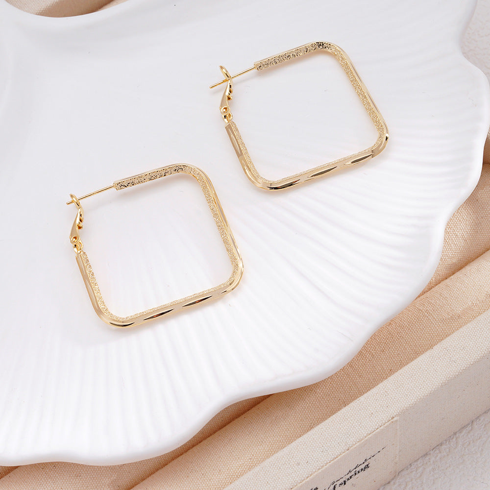 Silver Needle Minimalist Square Earrings With A Chic Cool And Understated Style