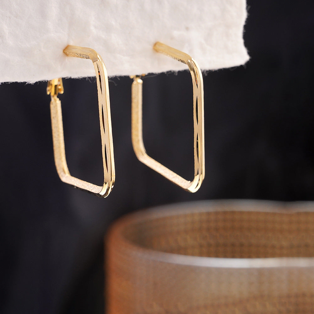 Silver Needle Minimalist Square Earrings With A Chic Cool And Understated Style