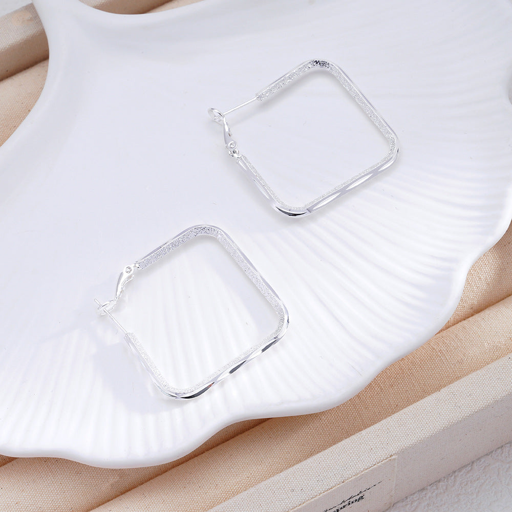 Silver Needle Minimalist Square Earrings With A Chic Cool And Understated Style