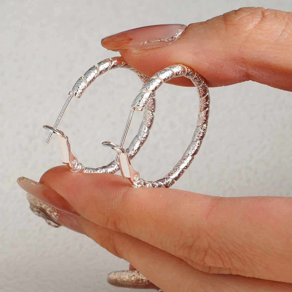 New Commuter-friendly Gold Twisted Hoop Earrings That Go With Everything