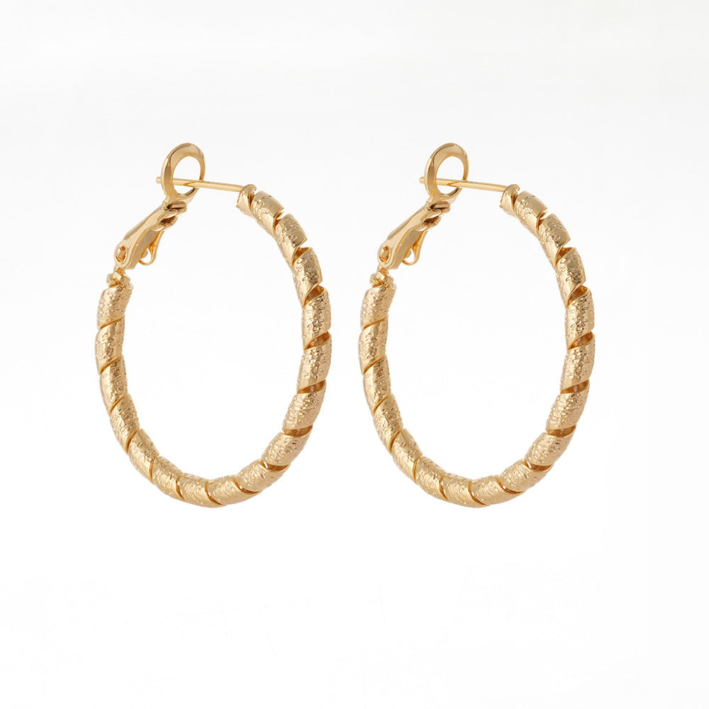 New Commuter-friendly Gold Twisted Hoop Earrings That Go With Everything