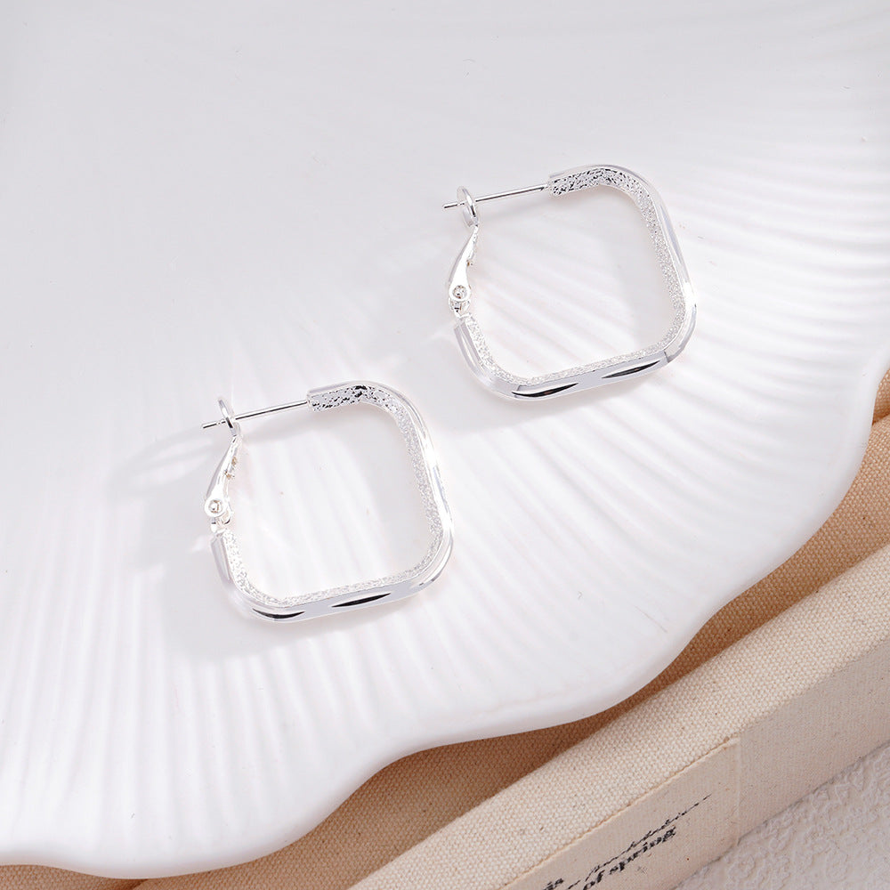 Fashionable Edgy Minimalist Square Earrings With A Cool Understated Vibe