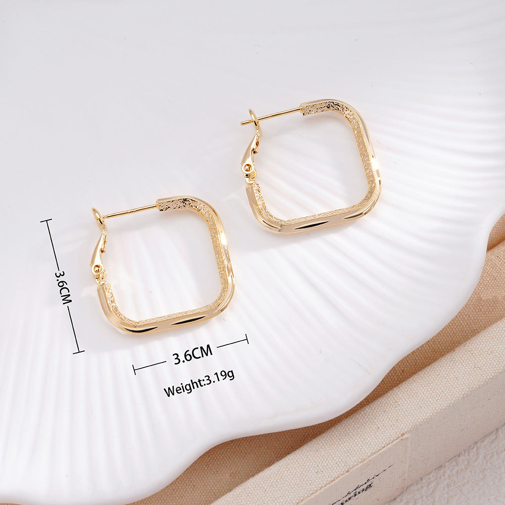 Fashionable Edgy Minimalist Square Earrings With A Cool Understated Vibe