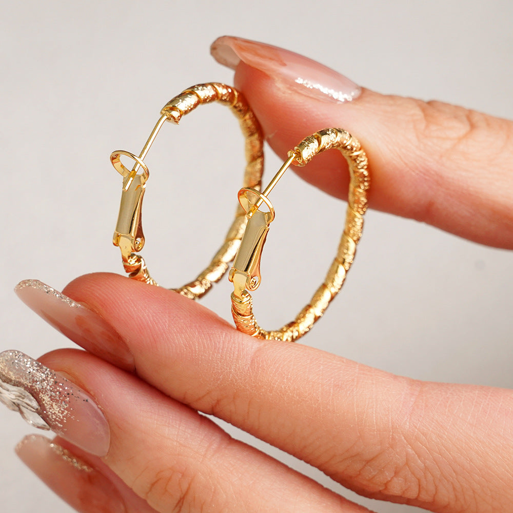 New Commuter-friendly Gold Twisted Hoop Earrings That Go With Everything
